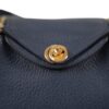 HERMÈS LINDY 19 mannequin side profile shot with strap drape