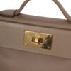 HERMÈS 24/24 MINI close up clasp and turnlock detail