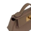 HERMÈS 24/24 MINI corner detail showing leather stitching