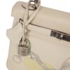 HERMÈS KELLY 25 mannequin side profile shot with strap drape