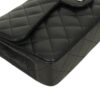EAST WEST FLAP CAVIAR close up of signature hardware detail