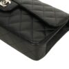 EAST WEST FLAP CAVIAR mannequin side profile shot with strap drape