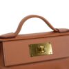 HERMÈS 24/24 MINI mannequin side profile shot with strap drape