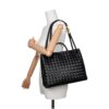 Bottega Veneta Andiamo Medium Black Woven Leather Bag – Angled Side View Crossbody Styled on Mannequin | KC Luxury Bags