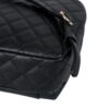 KCLUXURYBAGS CC Day Backpack - Close-Up Side View on White Background
