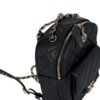 KCLUXURYBAGS CC Day Backpack - Angled Side View Showing Straps