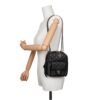 KCLUXURYBAGS CC Day Backpack - Side View Styled on Person